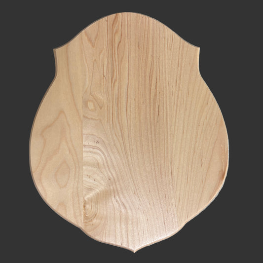 Wooden cutting board on a gray surface